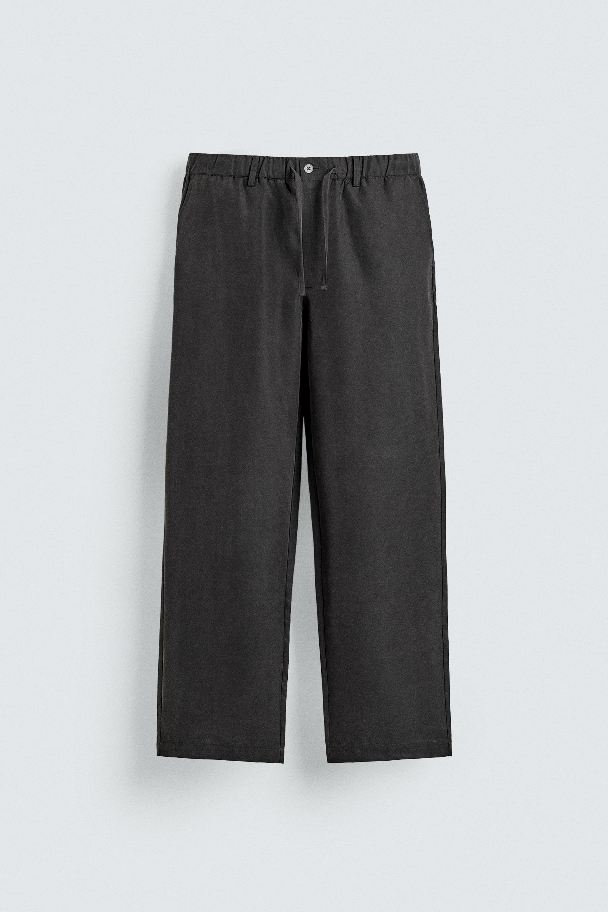 RELAXED FIT FLOWY PANTS